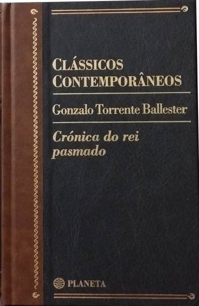 Livro de capa dura azul e castanha com texto dourado