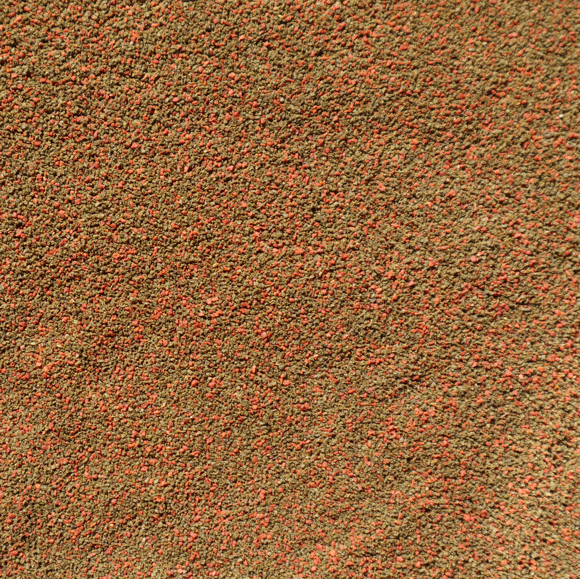 Granulado Malawi 0.5mm Tecido ou tapete castanho com pontos vermelhos e textura granulada