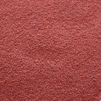 Superfície granulada vermelha escura