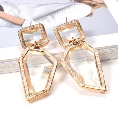 brincos dourados com pedra transparente geométrica