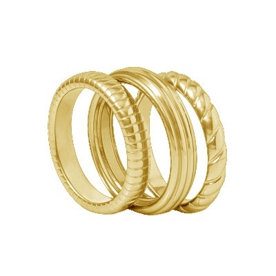 Três anéis dourados com diferentes padrões de superfície