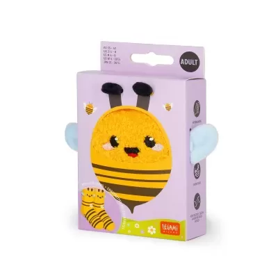 Caixa lilás com meias amarelas e pretas com padrão de abelha e detalhes azuis