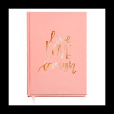 Caderno rosa com palavras douradas e fita marcador