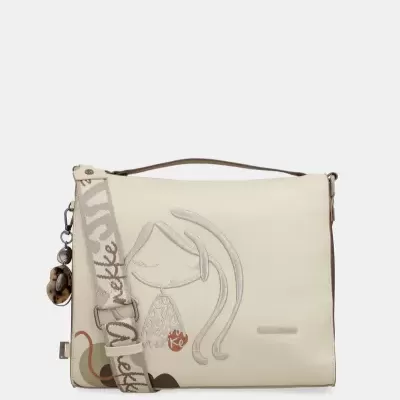 Mala creme com desenho bordado e alça estampada