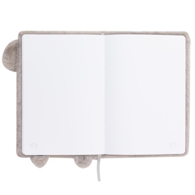Caderno aberto com capa cinzenta peluda e páginas em branco.