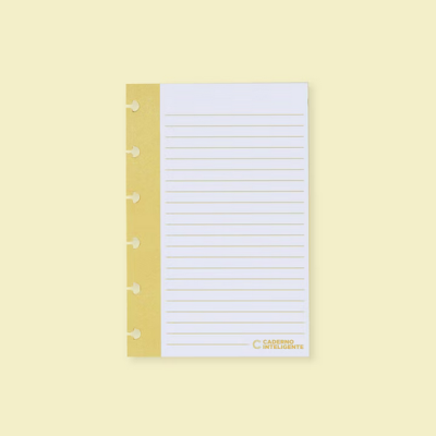 Folha de caderno branca com linhas castanhas e margem amarela, com texto CADERNO INTELIGENTE