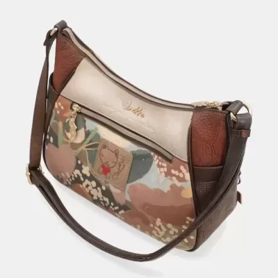 Mala de ombro com padrão floral e detalhes castanhos e bege