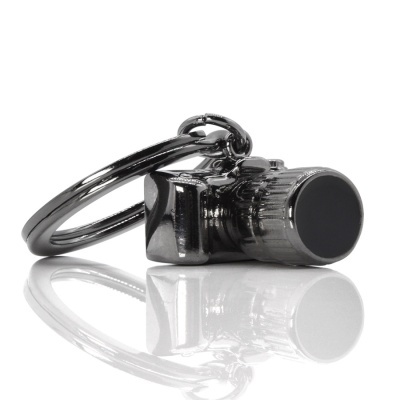 Chaveiro metálico em forma de câmara fotográfica cinza prateado