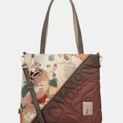 Mala de ombro Anekke com padrão floral colorido e couro castanho com relevo