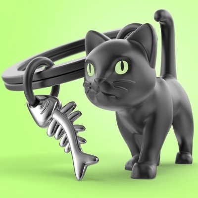 Chaveiro de gato preto com pendente metálico forma espinha de peixe
