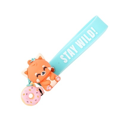 Prendedor azul claro STAY WILD! com chaveiros de raposa e donut