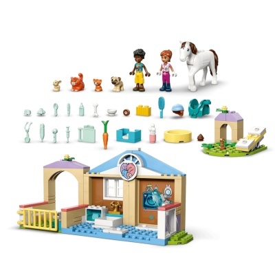 Conjunto de blocos de construção com figuras humanas, animais e edifício veterinário