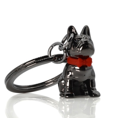 Porta-chaves de cão metálico preto com gravata vermelha