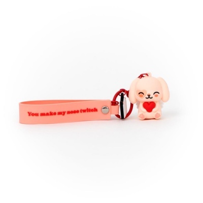 Chaveiro rosa com pingente de cão e texto em relevo