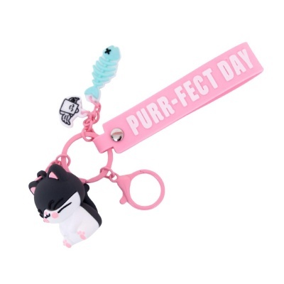 Chaveiro rosa com figura de gato e acessórios em borracha com texto PURR-FECT DAY.
