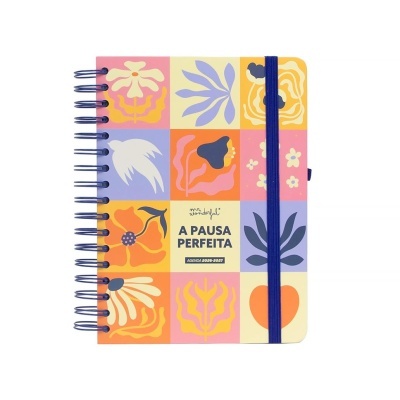 Agenda colorida com padrão floral e texto na capa