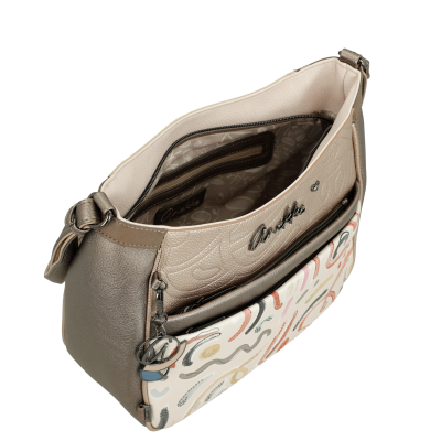 Mala de ombro bege e castanho com bolso exterior branco e padrão abstrato colorido