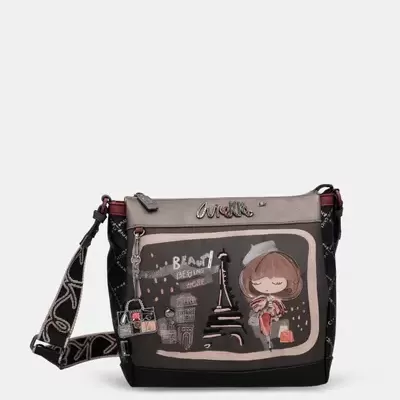 Mala tiracolo preta e bege com ilustração de rapariga e Torre Eiffel