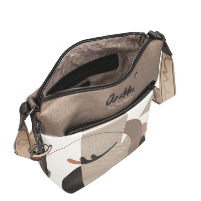 Mala de ombro bege e branco com padrão geométrico e correia ajustável