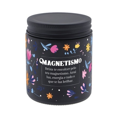 Frasco preto decorado com flores coloridas e texto em branco sobre magnetismo