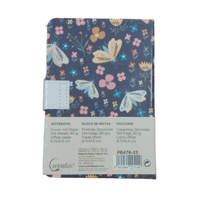 Caderno com capa floral azul e etiqueta branca