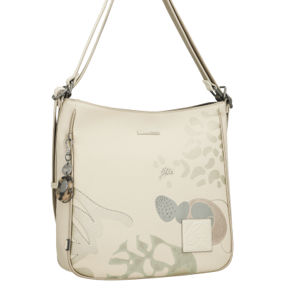 Mala de ombro bege com padrão vegetal e pendente decorativo