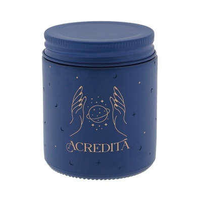 Pote azul escuro com ilustração dourada de mãos, planeta e texto ACREDITA