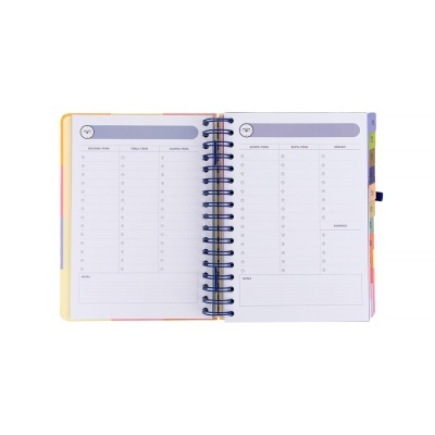 Agenda semanal aberta com encadernação em espiral e abas coloridas.