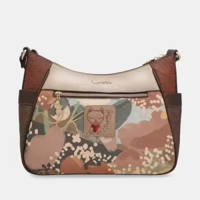 Mala de ombro com padrão floral em tons castanhos e bege com etiqueta de gato.