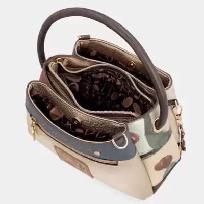 Mala de senhora castanha e bege com interior forrado e bolsos