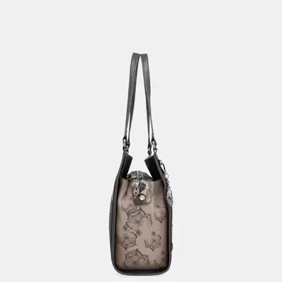 Mala de ombro com padrão decorativo em tons castanhos e alças pretas, vista de perfil