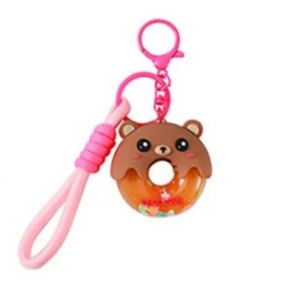 Chaveiro donut urso castanho com aro rosa e cordão silicone rosa