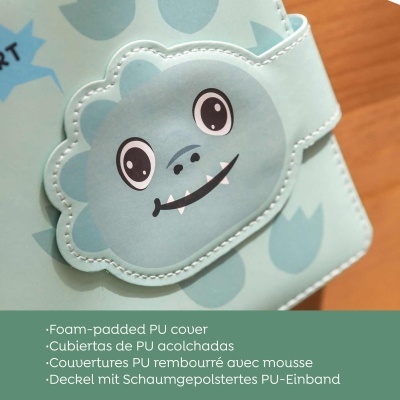 Capa azul claro com rosto de dinossauro sorridente em destaque e texto descritivo em múltiplas línguas em fundo verde.
