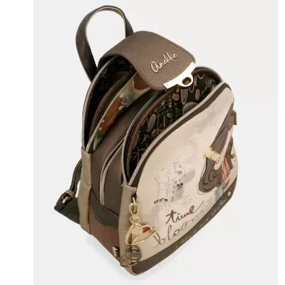 Mochila castanha e bege com ilustração e texto time to bloom e detalhes metálicos dourados