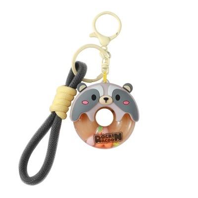 Porta-chaves com figura de guaxinim e corda elástica preta e amarela