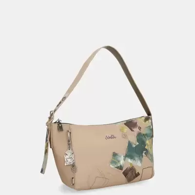 Mala bege com padrão abstrato e alça curta