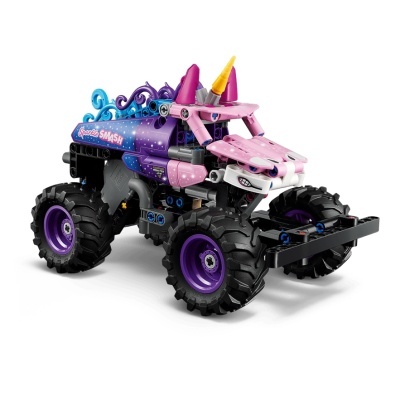 Brinquedo monster truck de blocos rosa e roxo com grandes rodas pretas.