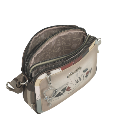 Mala pequena multicolorida com padrão gráfico e chaveiro metálico