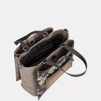 Mala de senhora castanha com padrão floral, vista de cima com várias divisões internas