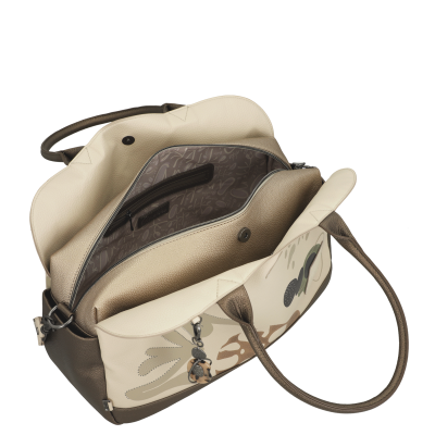 Sacola bege e castanha com padrão de folhas e bolso interior