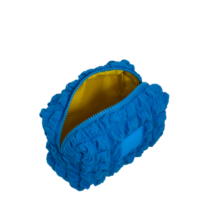 Bolsa felpuda azul com interior amarelo e fecho azul