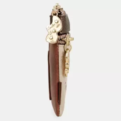 Carteira fina bicolor com fecho dourado e pendente em forma de guitarra
