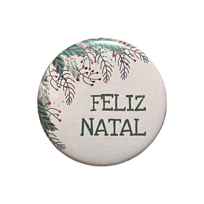 prato redondo com texto 'FELIZ NATAL' e decoração de ramos natalícios