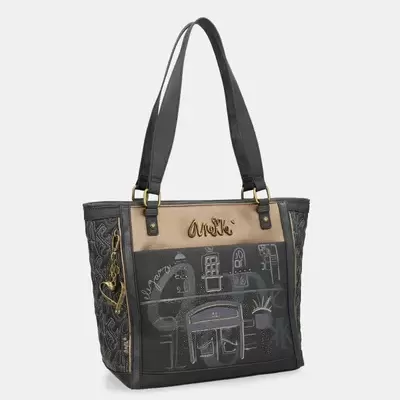 Mala de senhora preta e bege com desenho tipo quadro negro