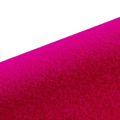 Superfície têxtil rosa fúcsia aveludada com textura macia