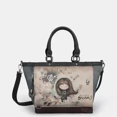 Mala de mão cinza e bege com ilustração e palavra Dreams