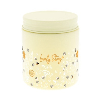 Frasco creme amarelo claro com tampa e decoração floral e abelhas