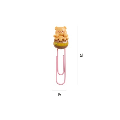 Clip de papel com decoração de urso em jarra de mel e clip rosa.