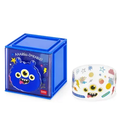 Caixa azul com monstro azul e pulseira branca com desenhos coloridos de monstros e estrelas
