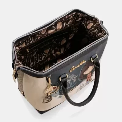 Mala de mão bege e preta com interior estampado e chaveiro dourado